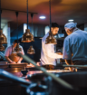 Professional kitchen with temporary chefs working