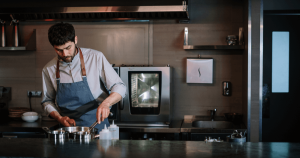 Image of an agency cooking in a restaurant kitchen