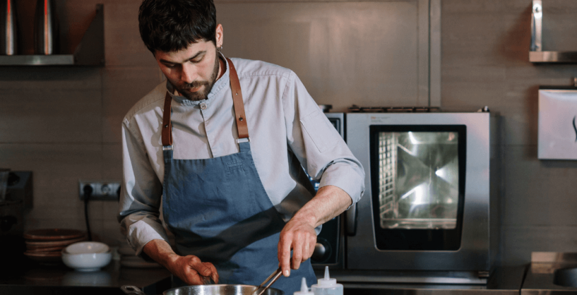 Image of an agency cooking in a restaurant kitchen