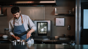Image of an agency cooking in a restaurant kitchen