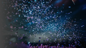 Event Work: image of a concert with bright blue and purple lights