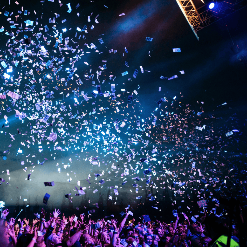 Event Work image of a concert with blue and purple lights