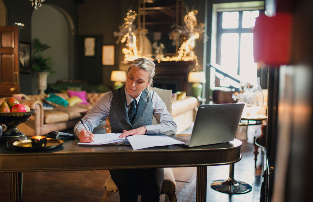 Leadership Skills: hospitality worker studying at a desk