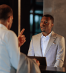 How to Handle Customer Complaints - hotel guest complaining to male receptionist